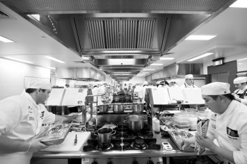 Golden chef contenders in kitchen 1