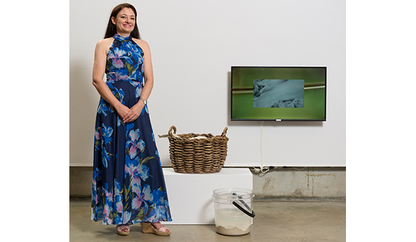 Ann Gillespie with her artwork Unseen/Undone