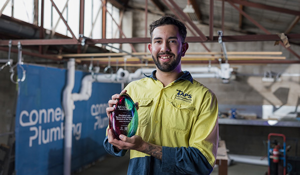 Callan McKenzie with his award.
