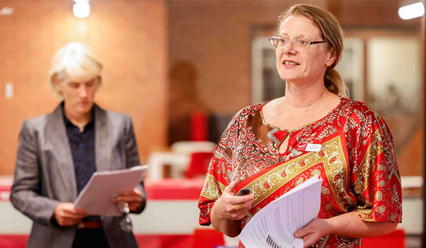 Researcher Laura Cunningham presenting to visiting delegation