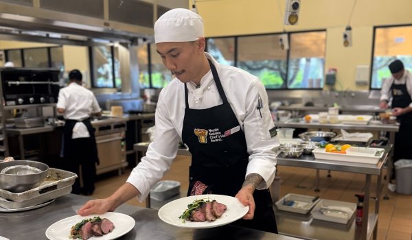 Charlie One plating up his main course for the Nestle Golden Chefs Hat competition.