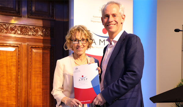 TAFE SA lecturer Zuzanna Gamrat receiving her AMEP award.